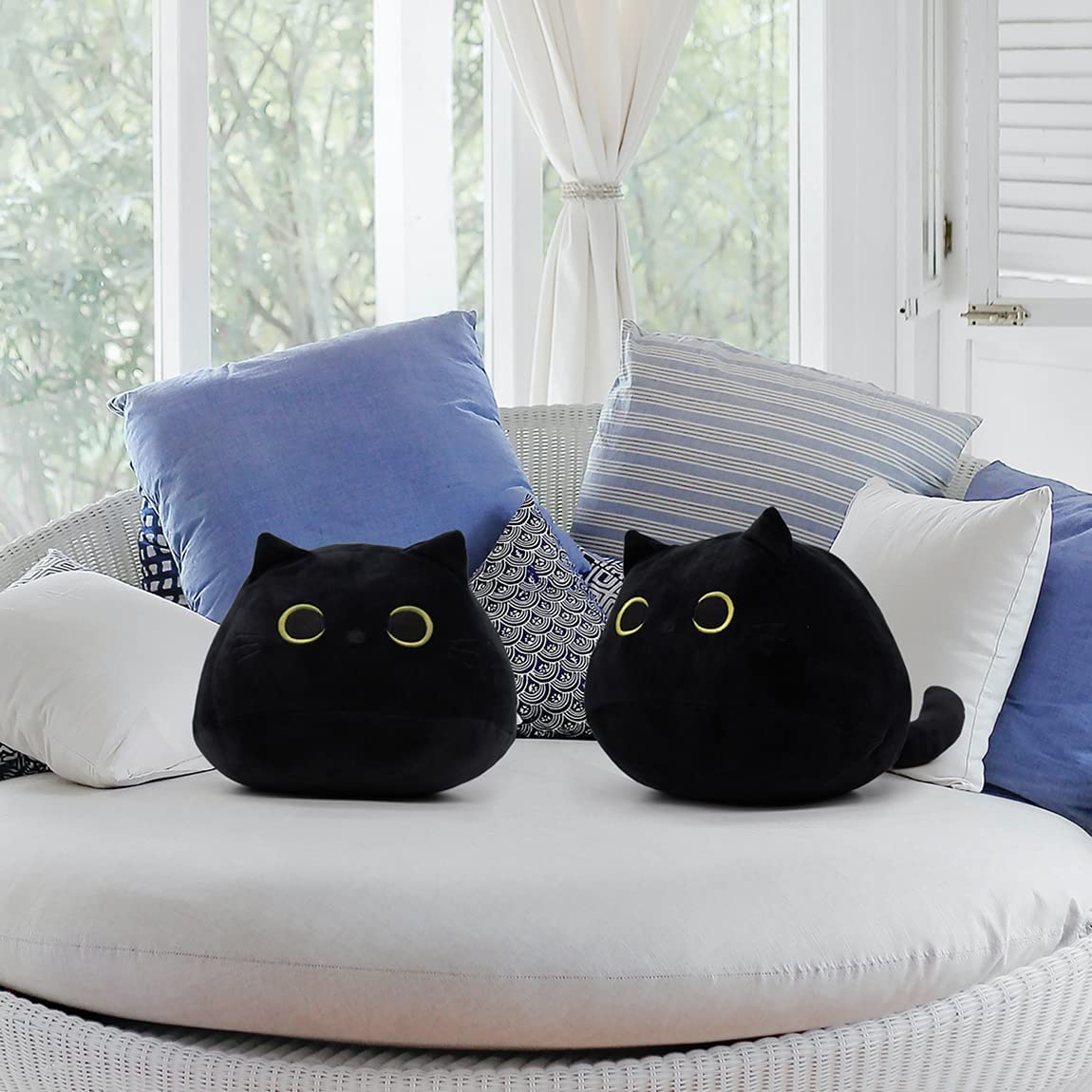 Two black cat plushies perfect for cuddles